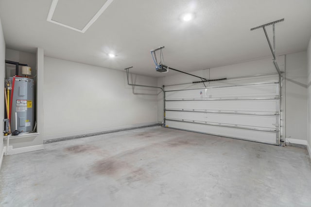 garage featuring electric water heater and a garage door opener