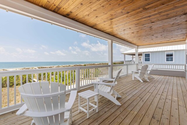 deck featuring a water view