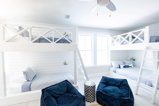 bedroom featuring light wood-type flooring and ceiling fan