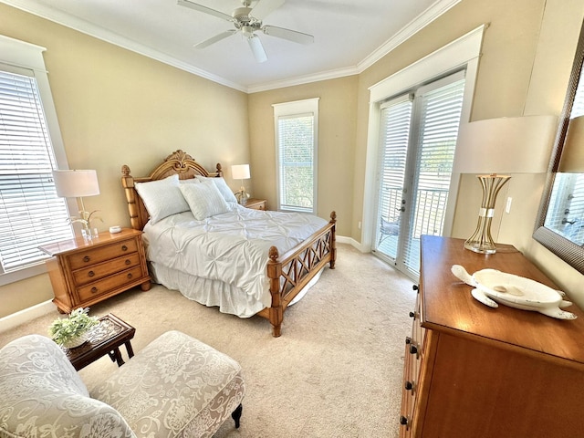 bedroom with access to outside, multiple windows, ceiling fan, and light carpet