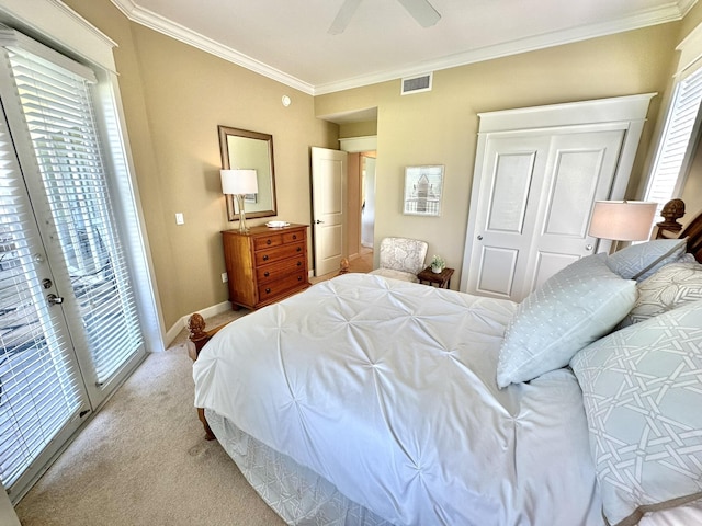 carpeted bedroom featuring access to outside, ceiling fan, and ornamental molding