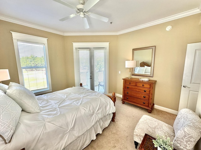 carpeted bedroom with ceiling fan, access to exterior, and ornamental molding