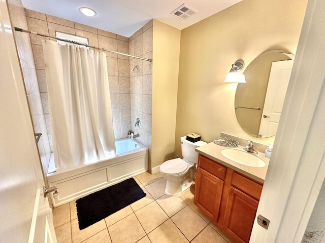 full bathroom with tile patterned flooring, vanity, toilet, and shower / tub combo with curtain