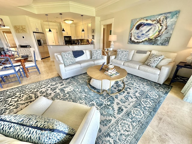 living room featuring crown molding