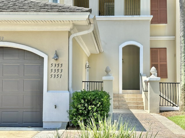 property entrance featuring a garage