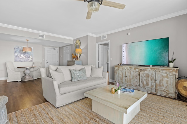 living room with ceiling fan, light hardwood / wood-style flooring, and ornamental molding