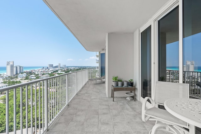 balcony featuring a water view