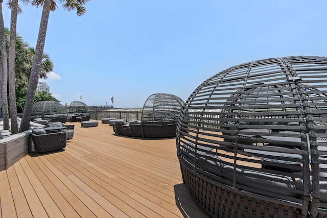 wooden deck featuring an outdoor hangout area