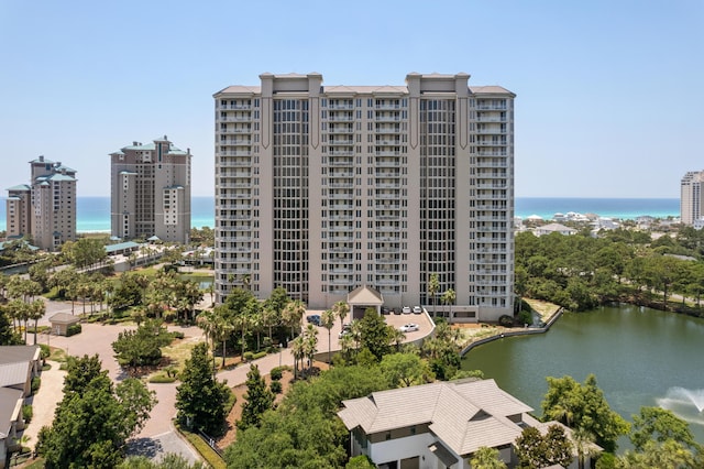 view of building exterior with a water view