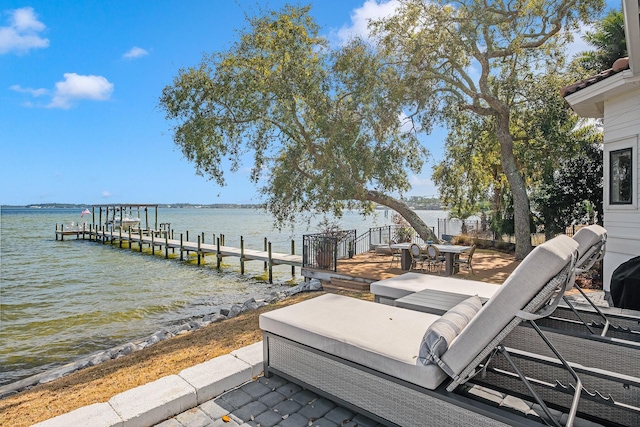 dock area featuring a water view