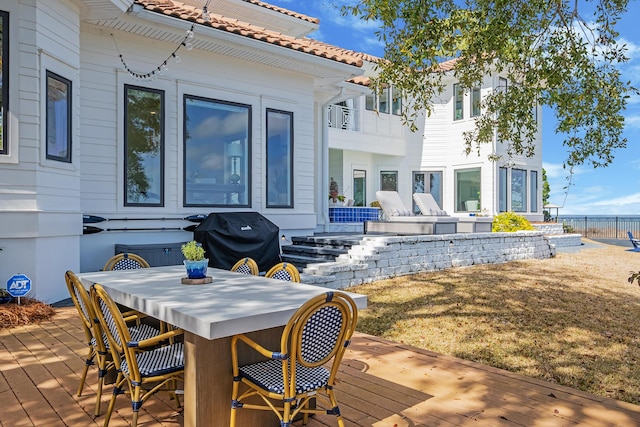 exterior space featuring a yard and a wooden deck