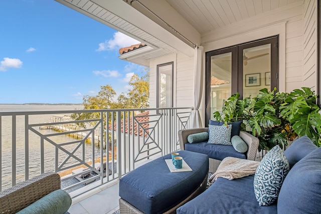 balcony featuring a water view