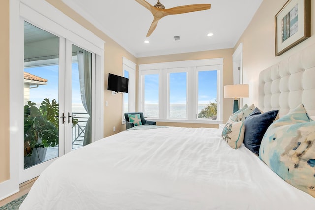 bedroom with access to outside, ceiling fan, french doors, and hardwood / wood-style floors