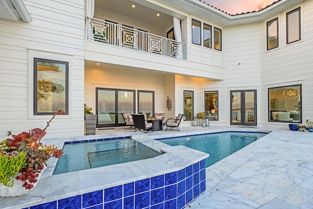 view of swimming pool featuring a patio