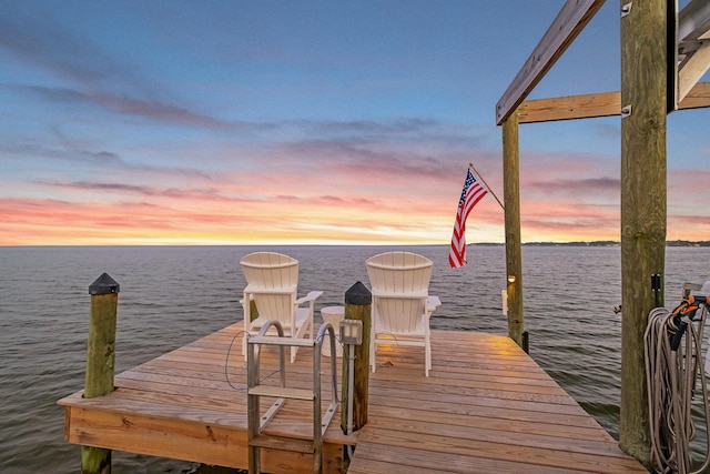 view of dock with a water view