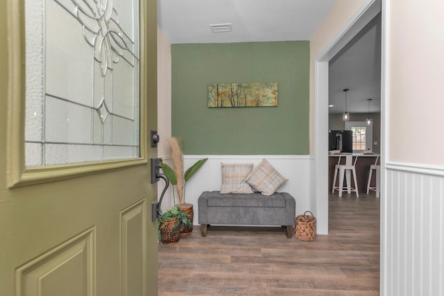 entrance foyer with dark hardwood / wood-style floors