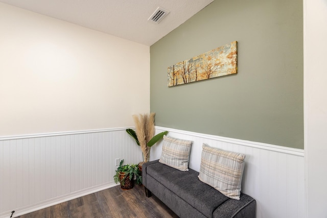 living area with dark hardwood / wood-style floors