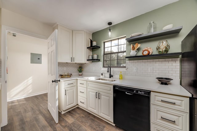 kitchen featuring sink, dark wood-type flooring, dishwasher, white cabinetry, and tasteful backsplash