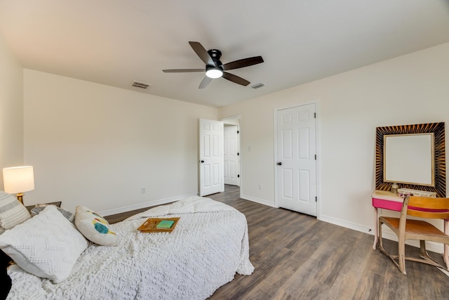 bedroom featuring ceiling fan and dark hardwood / wood-style flooring