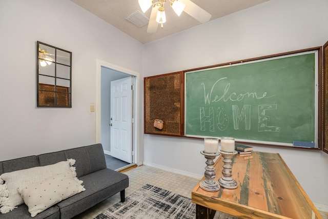 living room featuring ceiling fan