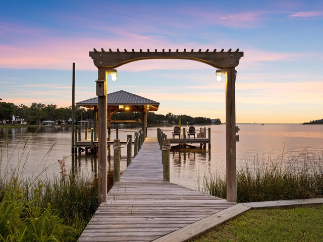 view of dock with a water view