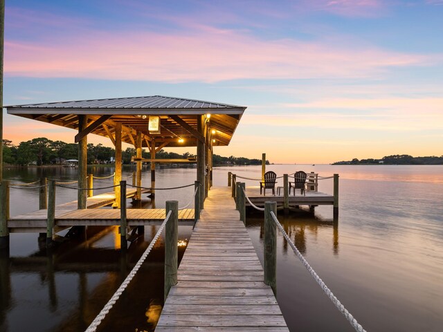 view of dock with a water view