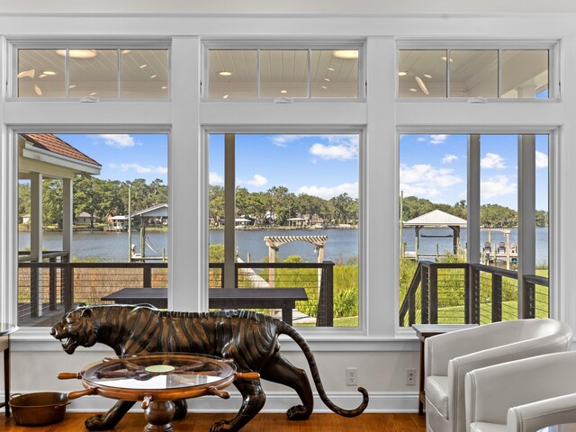 sunroom with a water view