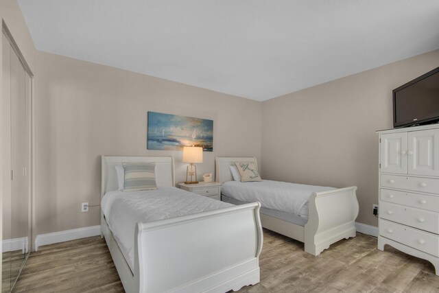 bedroom featuring light hardwood / wood-style flooring