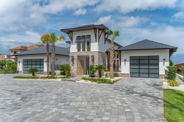 view of front of property with a garage