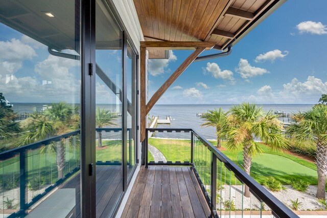 balcony featuring a water view