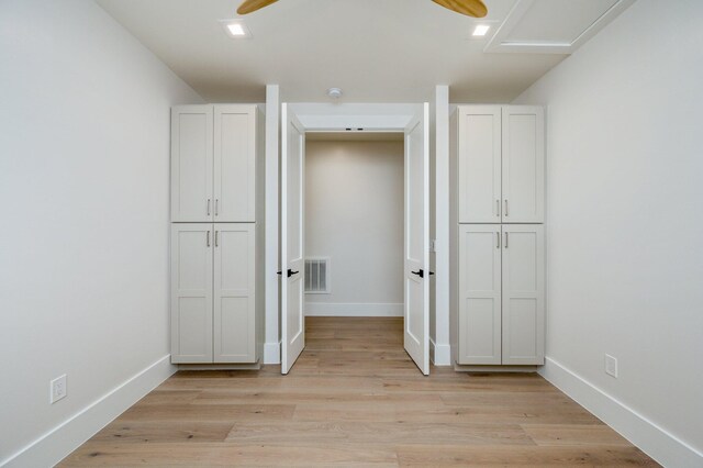 unfurnished bedroom featuring ceiling fan and light hardwood / wood-style flooring