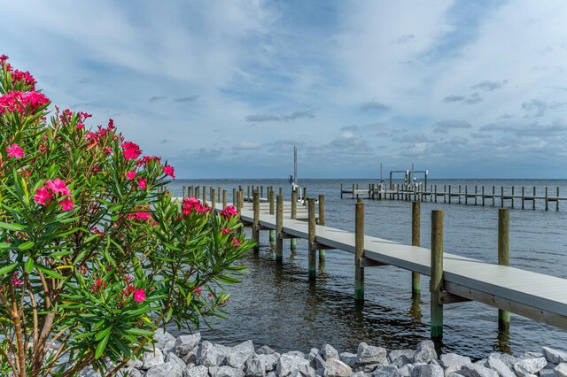 view of dock with a water view