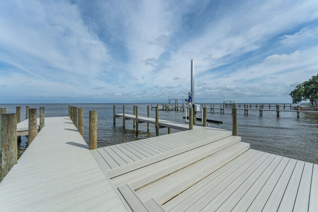 dock area featuring a water view