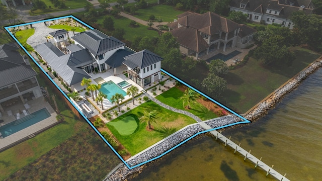 birds eye view of property featuring a water view