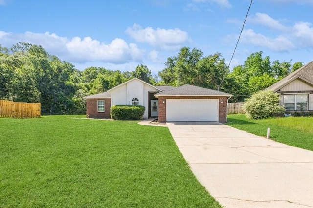 single story home featuring a garage and a front lawn