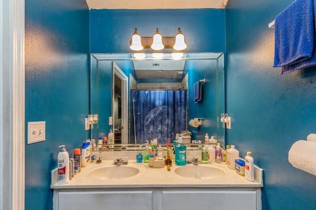 bathroom featuring double sink vanity