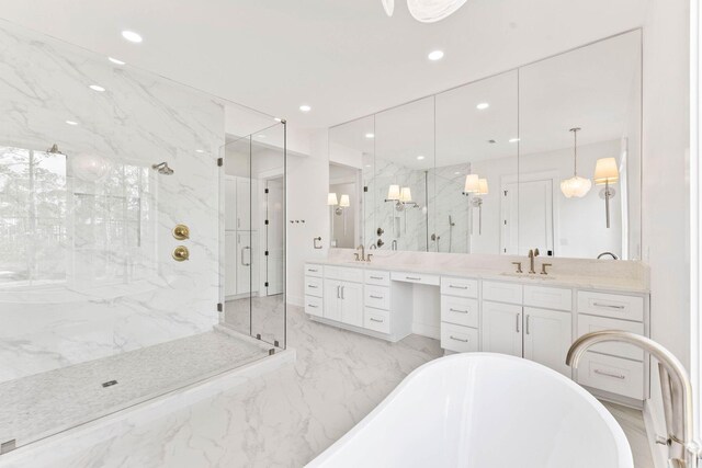 109 W Nursery Rd, Santa Rosa Beach, FL 32459 - bathroom with a marble finish shower, marble tiled floors, a freestanding bath, vanity, and recessed lighting