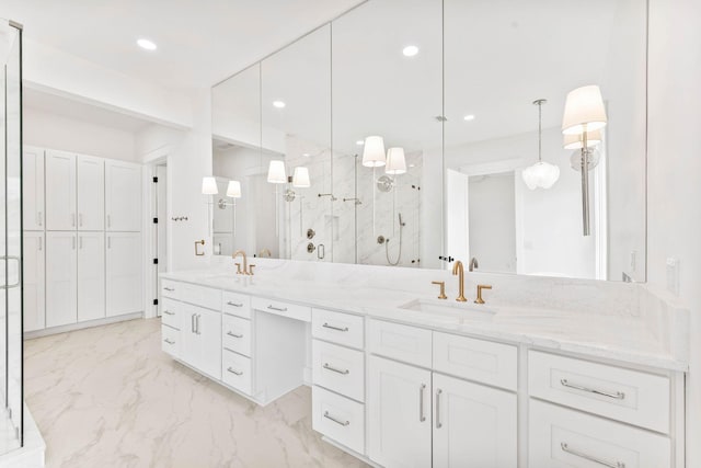 bathroom featuring a shower with door, tile patterned flooring, and double sink vanity