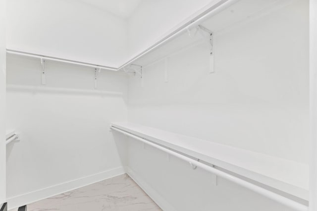 109 W Nursery Rd, Santa Rosa Beach, FL 32459 - walk in closet featuring light marble finish floors