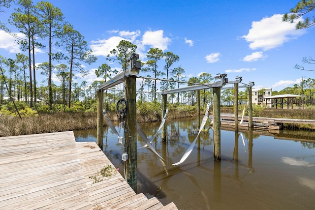 109 W Nursery Rd, Santa Rosa Beach, FL 32459 - dock area featuring boat lift and a water view