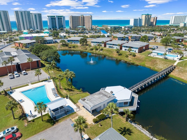 birds eye view of property featuring a water view