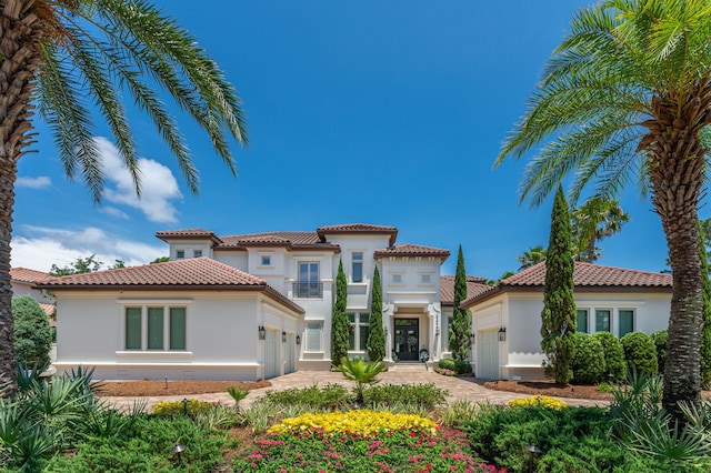 view of front of property with a garage