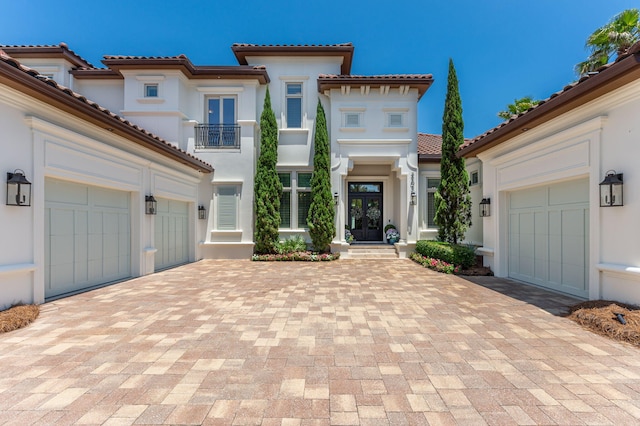 mediterranean / spanish house with a balcony