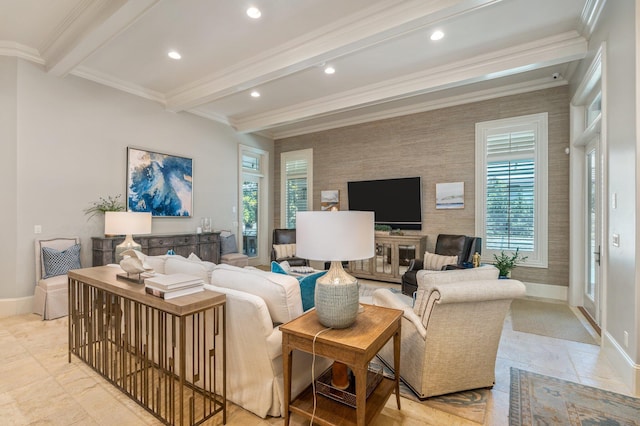 living room with beam ceiling, crown molding, and plenty of natural light