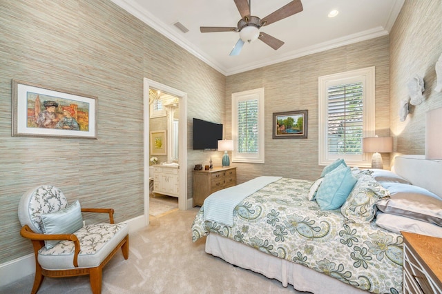 bedroom with light carpet, connected bathroom, ceiling fan, and ornamental molding