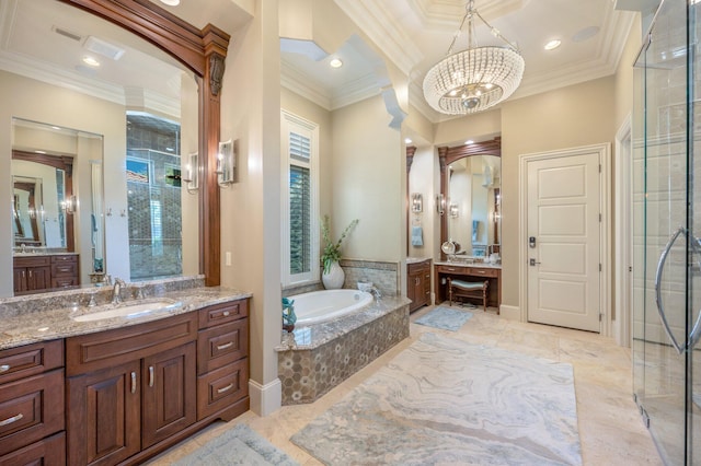 bathroom with vanity, shower with separate bathtub, crown molding, and an inviting chandelier