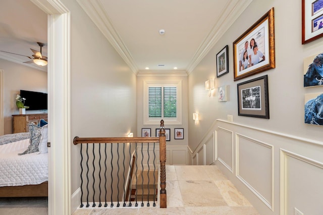 hallway featuring ornamental molding