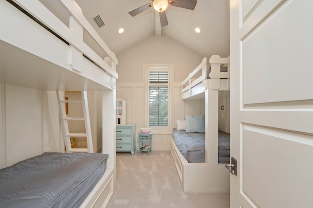 bedroom featuring vaulted ceiling with beams, ceiling fan, and light colored carpet