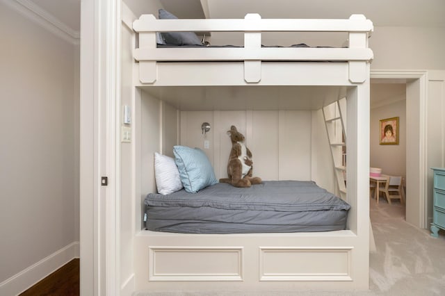 carpeted bedroom featuring ornamental molding