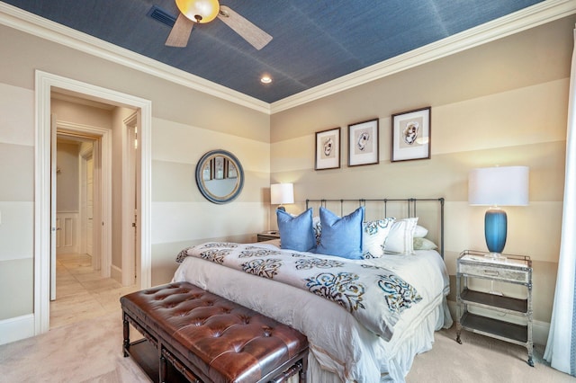 bedroom with ceiling fan, light carpet, and ornamental molding